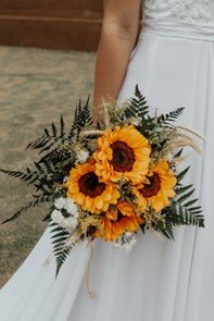 Close-Up of a Woman Holding a Wedding Bouquet